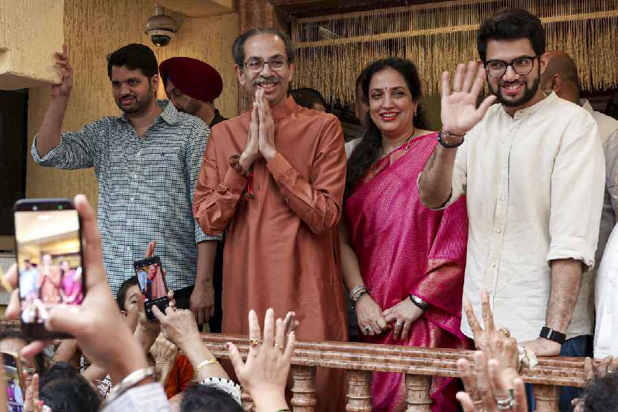 Uddhav Thackeray, accompanied by wife Rashmi and son Aaditya, meets winning candidates from the Shiv Sena (UBT) at his Mumbai residence on Saturday.