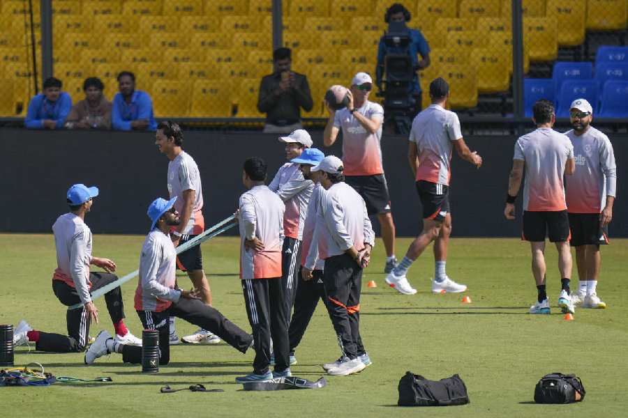 Mohammed Siraj warms up during practice in Indore on Saturday.