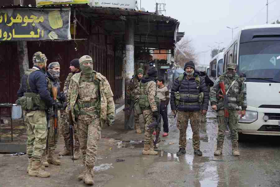 Members of the Syrian army are deployed after the withdrawal of the Syrian Democratic Forces (SDF), in Tabqa, Syria, January 18, 2026.