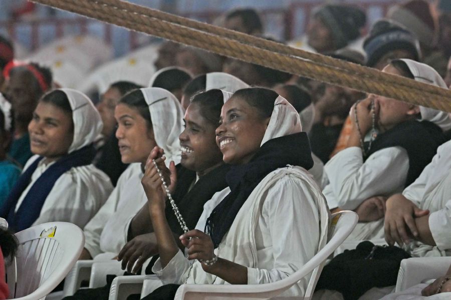 Nuns from the Missionaries of Charity engrossed during a show at Ajanta Circus