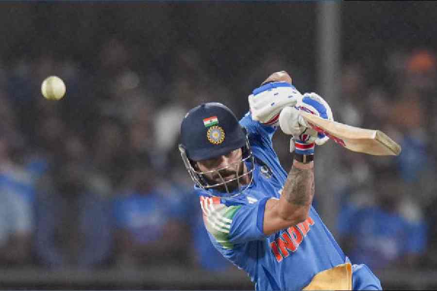 Virat Kohli plays a drive during his sparkling innings of 124 off 108 balls in the third ODI against New Zealand in Indore on Sunday. However, it was not enough for India to win the match.