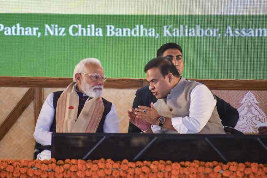 Prime Minister Narendra Modi with chief minister Himanta Biswa Sarma during the event at Kaliabor in Assam’s Nagaon district on Sunday.