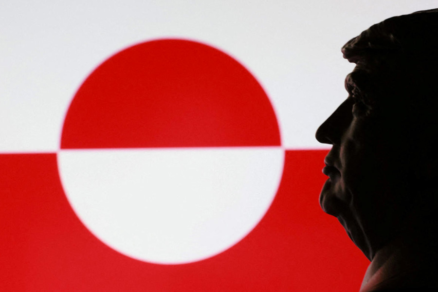 FILE PHOTO: Illustration shows 3D printed miniature of U.S. president Donald Trump and Greenland flag.