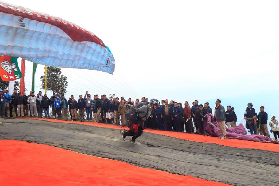 A paraglider prepares for take-off at the First Rhenock Sikkim Paragliding Accuracy Championship 2026 in Pakyong on Sunday.