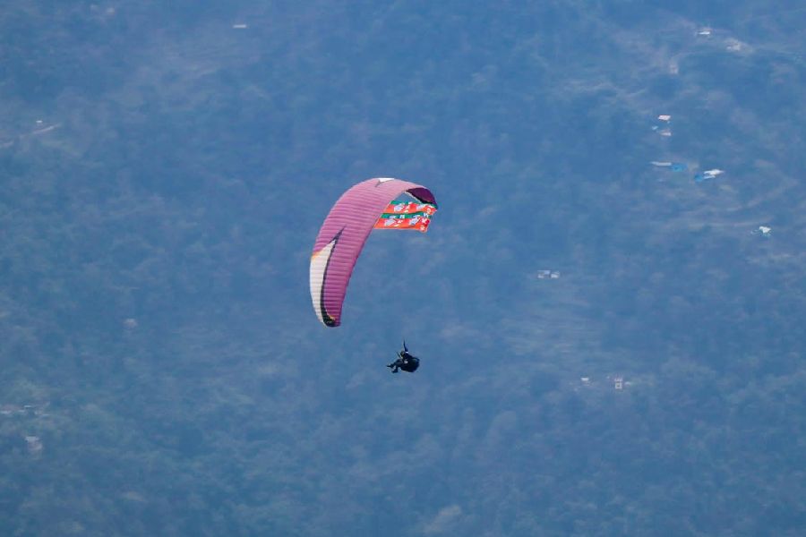 A paraglider up in the air in the championship