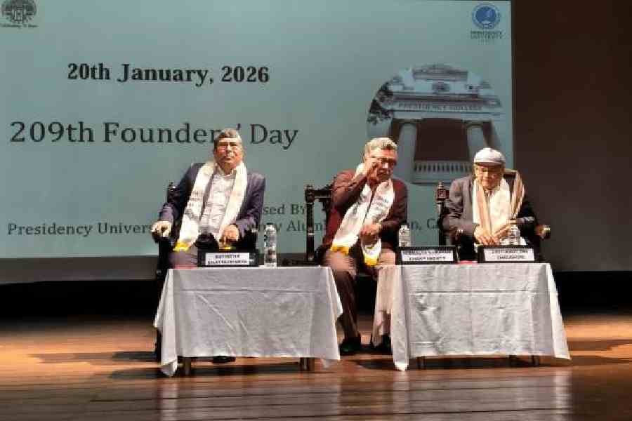 Presidency VC Nirmalya Narayan Chakraborty (centre) with alumni Sutirtha Bhattacharya and Jyotirmoy Pal Chaudhuri at the programme