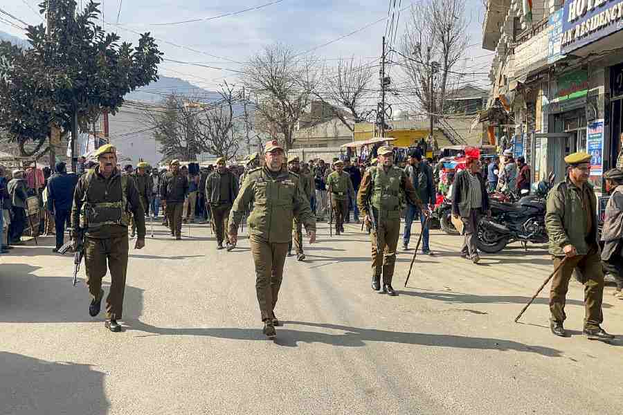 Police personnel during a protest in Jammu and Kashmir.