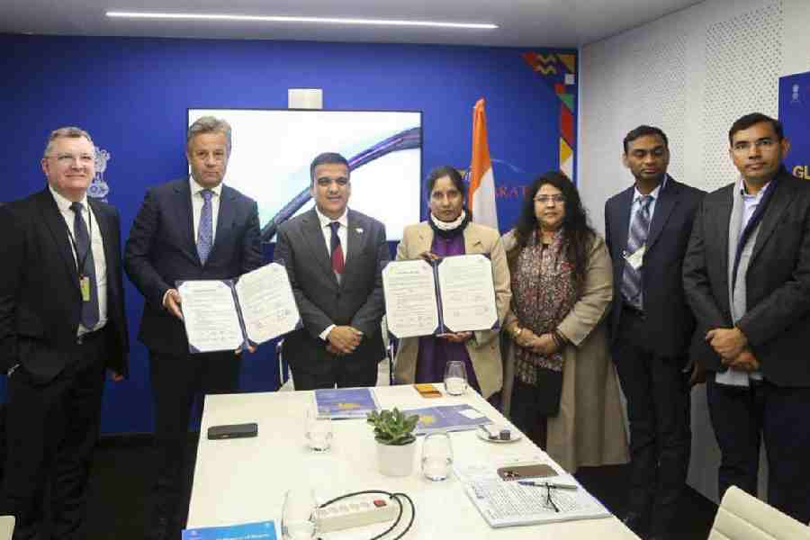 In this image posted on Jan. 21, 2026, Gujarat Deputy Chief Minister Harsh Sanghavi, third left, meets SEALSQ Corp Chairman Creus Moreira, second left, and others during a meeting, in Davos, Switzerland.