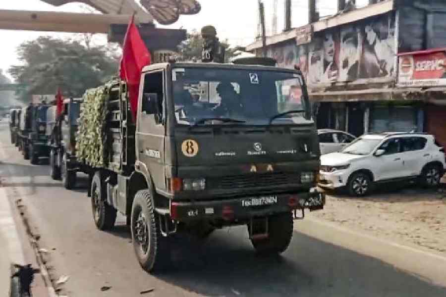 Army personnel during a flag march through a sensitive area following recent communal clashes in Kokrajhar on Wednesday. 