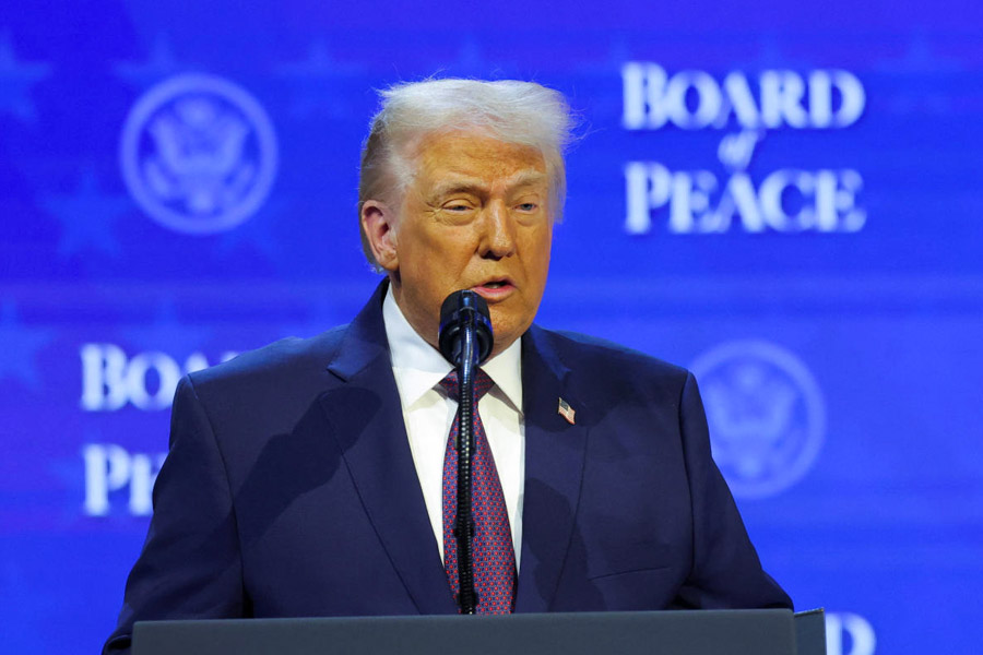U.S. President Donald Trump takes part in a charter announcement for his Board of Peace initiative aimed at resolving global conflicts, alongside the 56th annual World Economic Forum (WEF), in Davos, Switzerland, January 22, 2026.