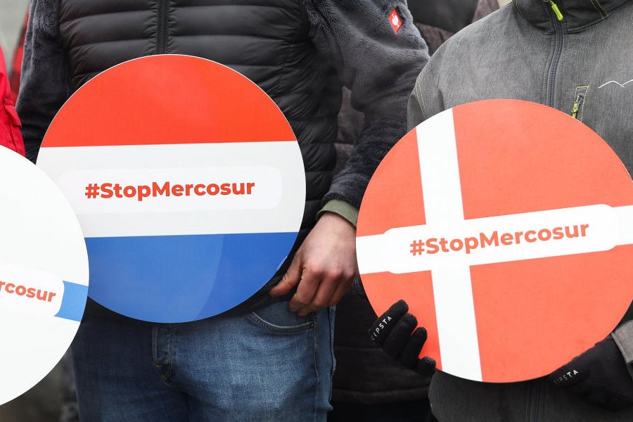 People hold placards against the EU-Mercosur trade agreement in various languages, during a farmers' protest, as the European Parliament votes on Wednesday on whether to refer the EU-Mercosur trade agreement to the Court of Justice of the European Union (CJEU), in Strasbourg, France, January 21, 2026.
