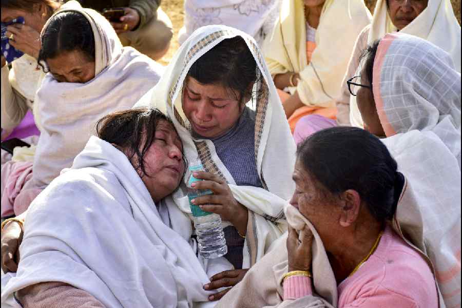 Family members ofM Rishikanta Singh grieve after identifying his body virtually on Thursday.