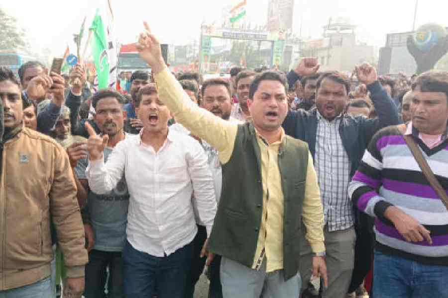 MLA Mosharraf Hossain (wearing green waistcoat) leads the blockade on NH12 in Itahar, North Dinajpur, on Thursday.