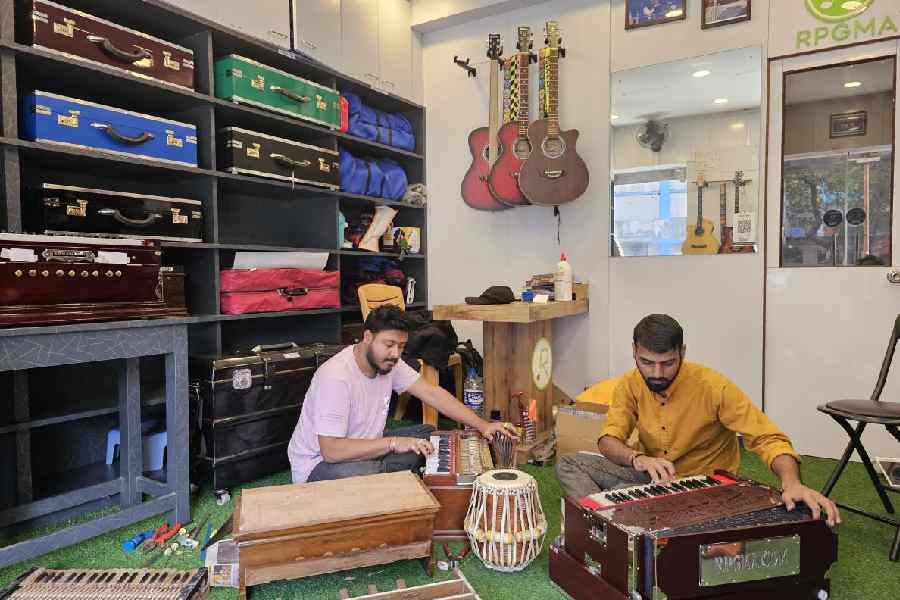 Harmoniums being repaired at the RPGMA showroom, Harmonium World, in Lake Town.