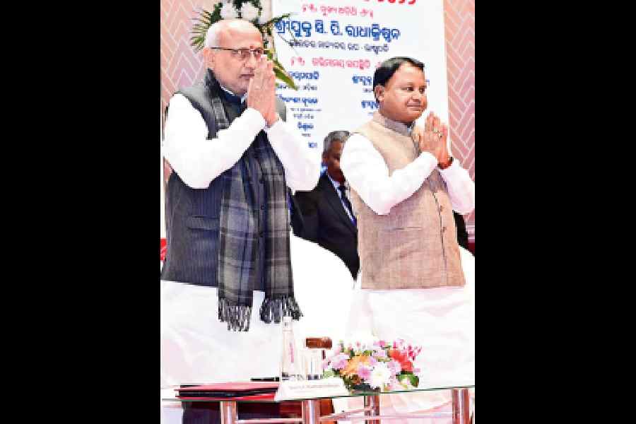 CP Radhakrishnan and Mohan Charan Majhi during Parakram Divas celebrations at Sankruti Bhavan in Cuttack on Friday