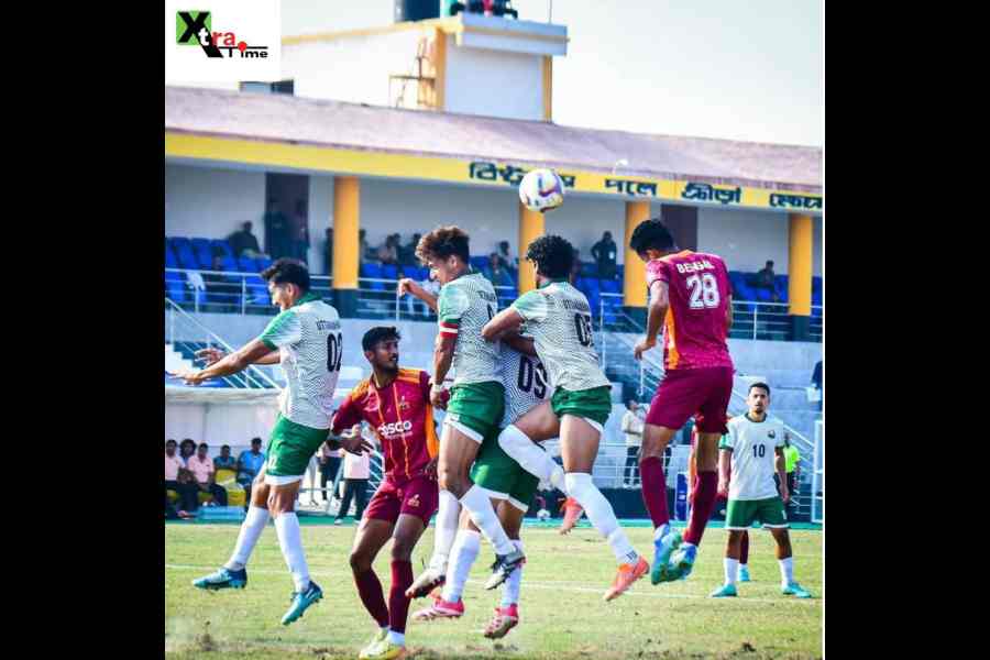 Norhari Shreshtha (No. 28) scores Bengal’s winner in the Santosh Trophy match against Uttarakhand on Friday.