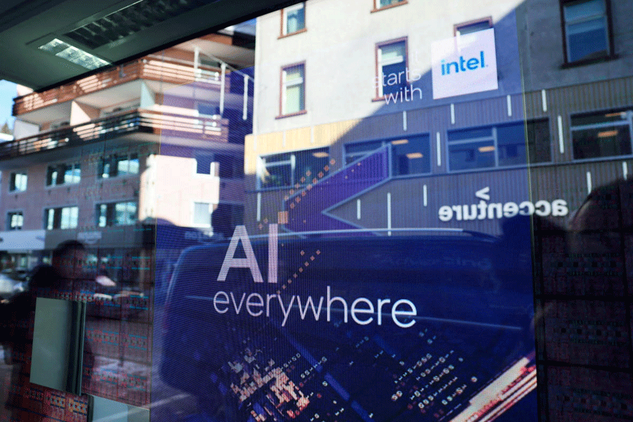 FILE PHOTO: A slogan related to Artificial Intelligence (AI) is displayed on a screen in Intel pavilion, during the 54th annual meeting of the World Economic Forum in Davos, Switzerland, January 16, 2024.