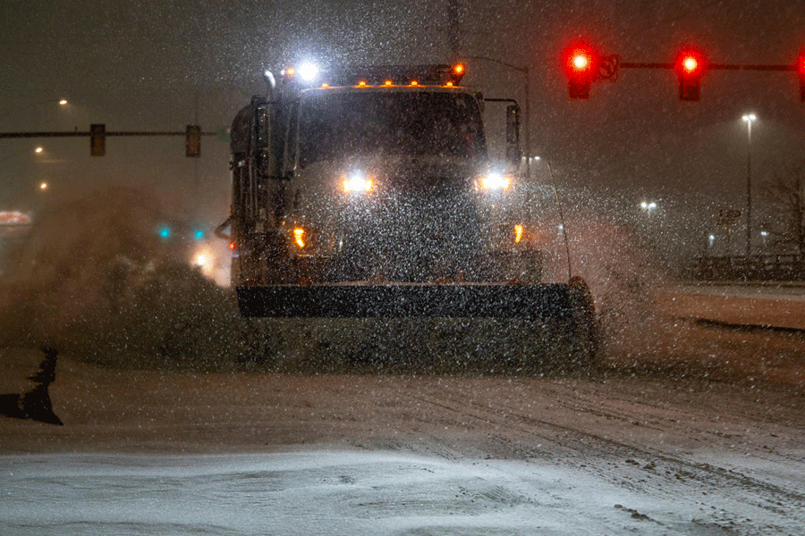 A vehicle equipped with a snowplow clears snow as Winter Storm Fern arrives in Oklahoma City, Oklahoma, U.S., January 23, 2026.