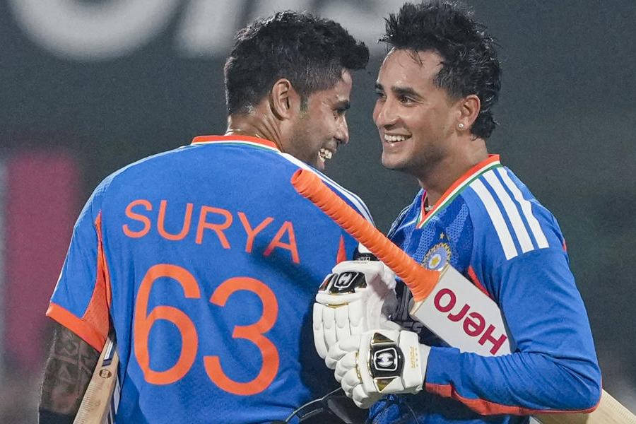 India's captain Suryakumar Yadav celebrates with teammate Abhishek Sharma after India won the third T20I cricket match against New Zealand, at ACA Stadium, Barsapara in Guwahati, Sunday, Jan. 25, 2026.