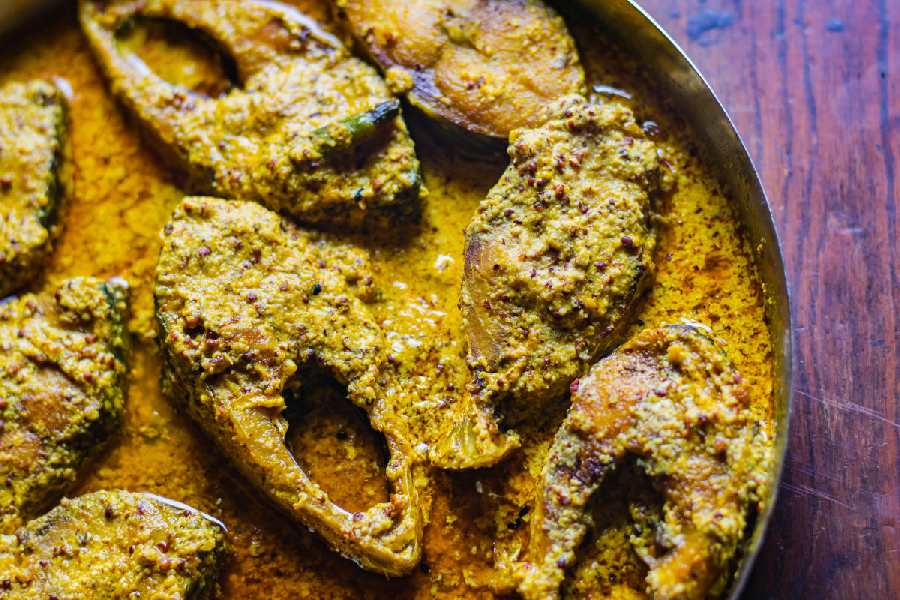 Sorshe ilish or hilsa fish curry cooked with mustard seeds
