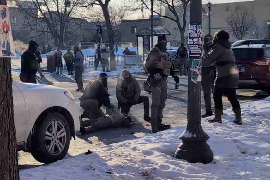 A screengrab from a video shows law enforcement officers kneeling next to the body of a man who was shot when federal agents were trying to detain him in Minneapolis, Minnesota, US, January 24, 2026.