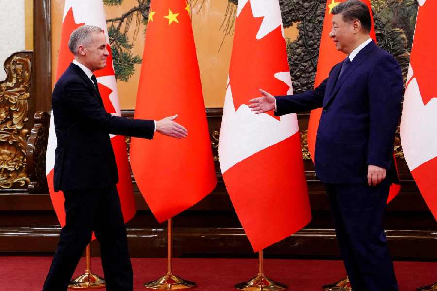 Canadian Prime Minister Mark Carney with President of China Xi Jinping at the Great Hall of the People in Beijing