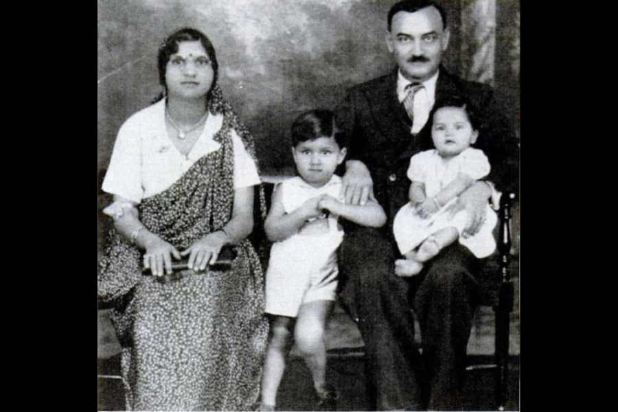 Singh with his parents and sister