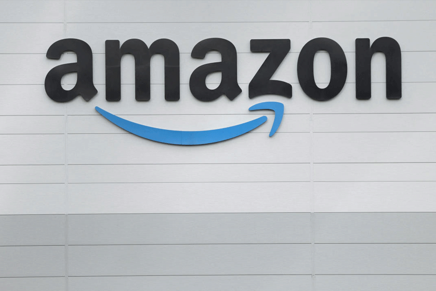 FILE PHOTO: The logo of Amazon outside its fulfilment centre in Baldonnell Business Park in Dublin, Ireland, October 28, 2025.