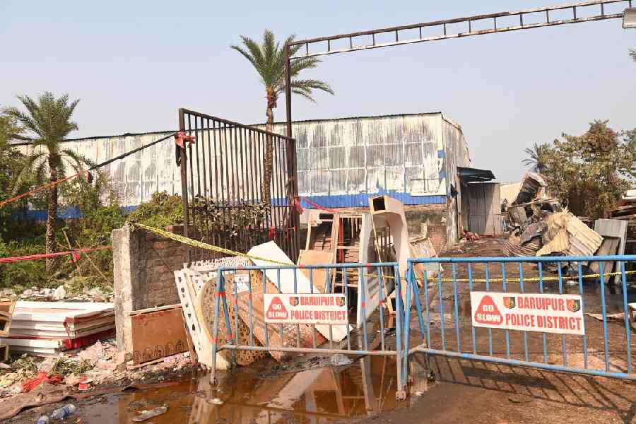 The cordoned-off site of the fire-ravaged godowns in Anandapur on Wednesday.