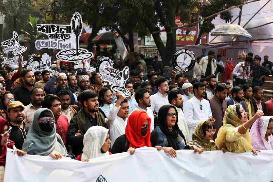Supporters of the National Citizen Party (NCP) hold placards and a banner while joining in the election campaign rally in Dhaka, Bangladesh, January 22, 2026.