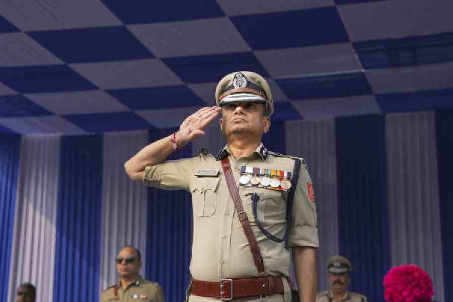 Bengal DGP Rajeev Kumar takes the salute during his farewell paradeat Alipore Bodyguard Lines on Thursday. (PTI picture)