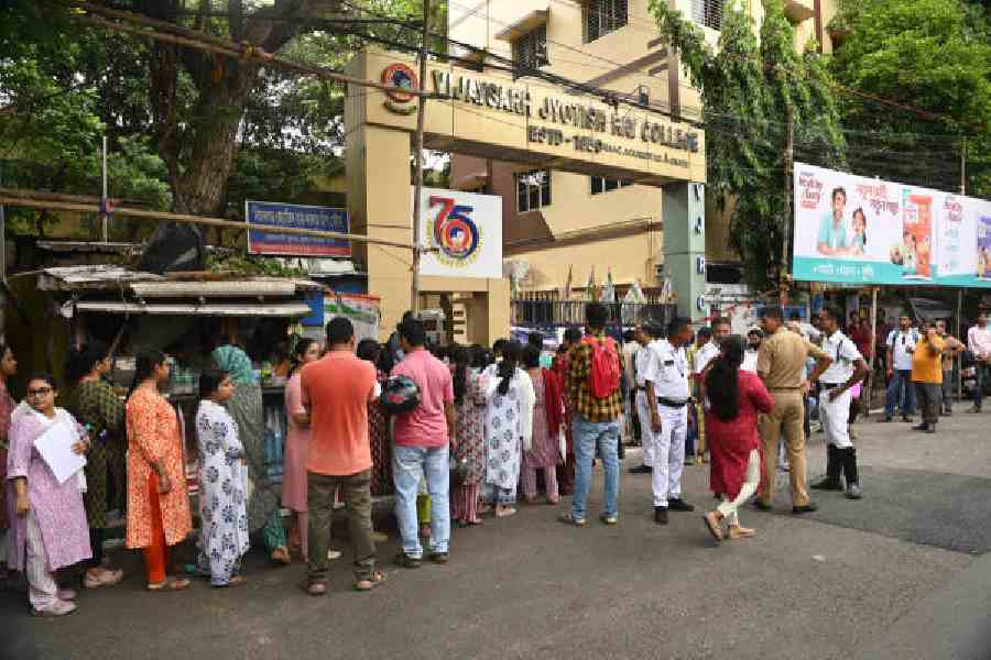 Teacher job aspirants at an exam centre last September