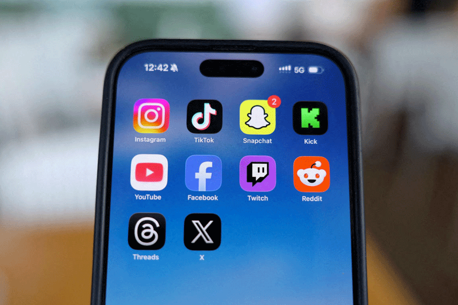 Social media apps are displayed on a mobile phone