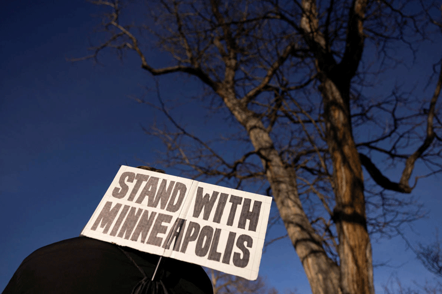 Demonstrators take part in an \"ICE OUT\" protest in Denver