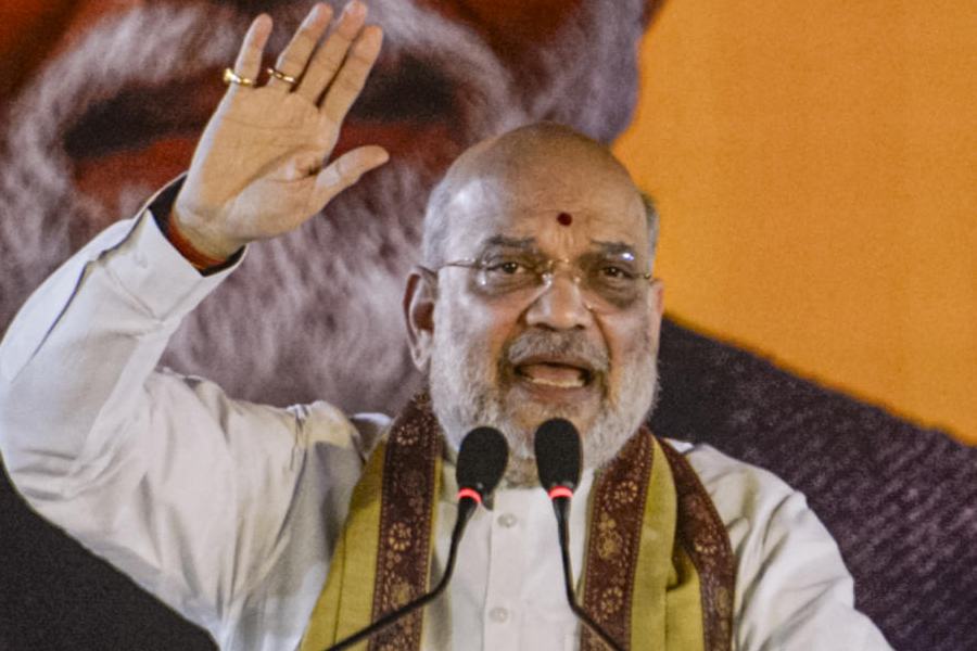 Union Home Minister Amit Shah addresses a gathering during BJP workers' meeting, at Barrackpore in North 24 Parganas district, West Bengal, Saturday, Jan. 31, 2026.