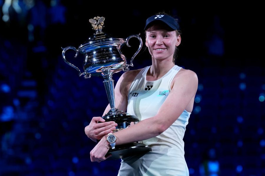 Elena Rybakina of Kazakhstan holds the Daphne Akhurst Memorial Cup after defeating Aryna Sabalenka of Belarus to win the women's singles final at the Australian Open tennis championship in Melbourne, Australia, Saturday, Jan. 31, 2026.