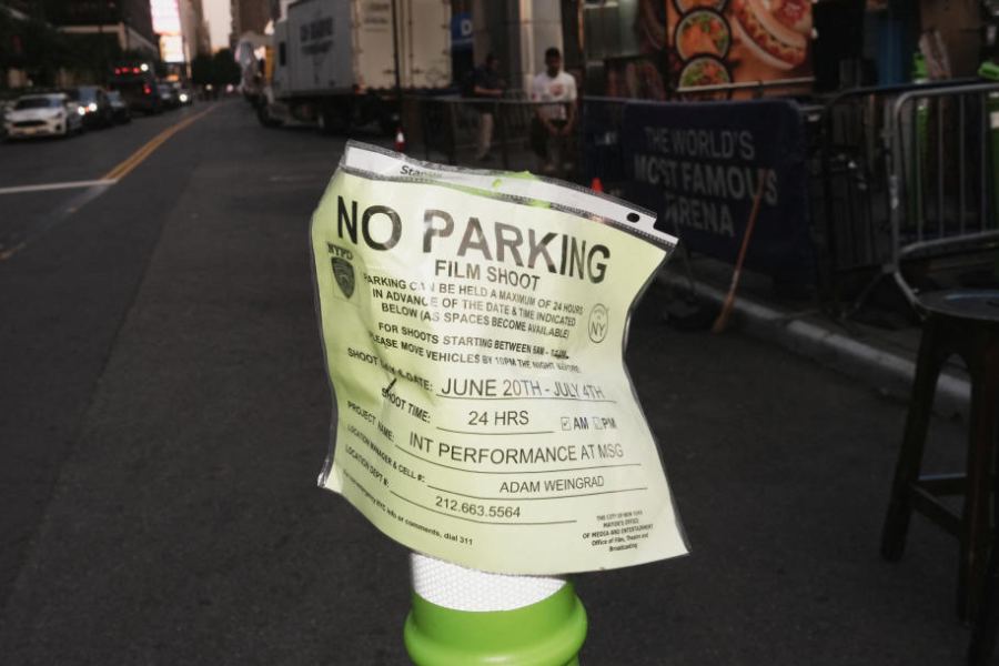 A temporary "no parking" sign issued by the NYPD for a film shoot outside Madison Square Garden, ahead of a reported wedding between singer Taylor Swift and National Football League player Travis Kelce