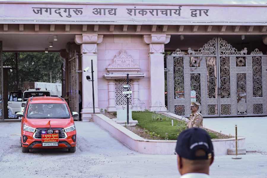Shri Ram Janmabhoomi Teerth Kshetra Trust member Vasudevanand Saraswati, in car, leaves after attending the trust meeting, in Ayodhya, Monday, July 6, 2026.