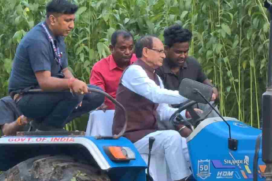 Union agriculture minister Shivraj Singh Chouhan test-drives a tractor at a jute farm at the Nilganj ICAR-Central Research Institute for Jute and Allied Fibres in Barrackpore on Tuesday. 