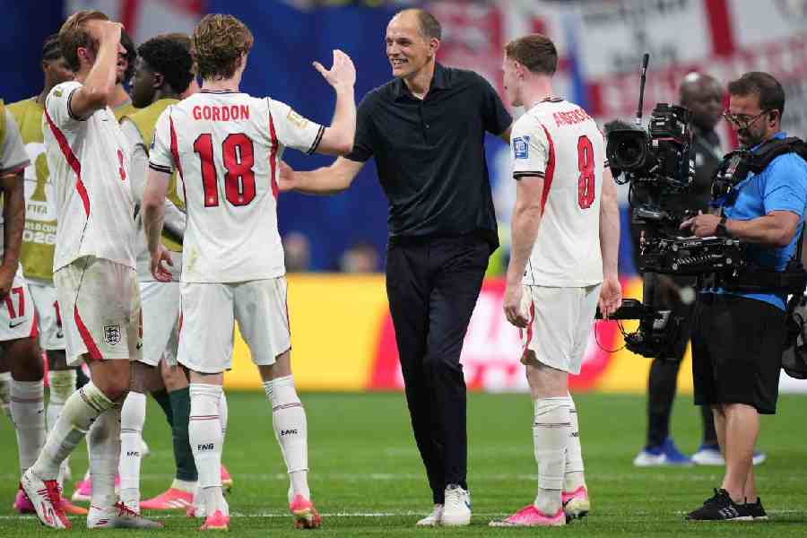 England head coach Thomas Tuchel celebrates with his players after the World Cup round of 32 soccer match between England and Congo in Atlanta, Wednesday, July 1, 2026.