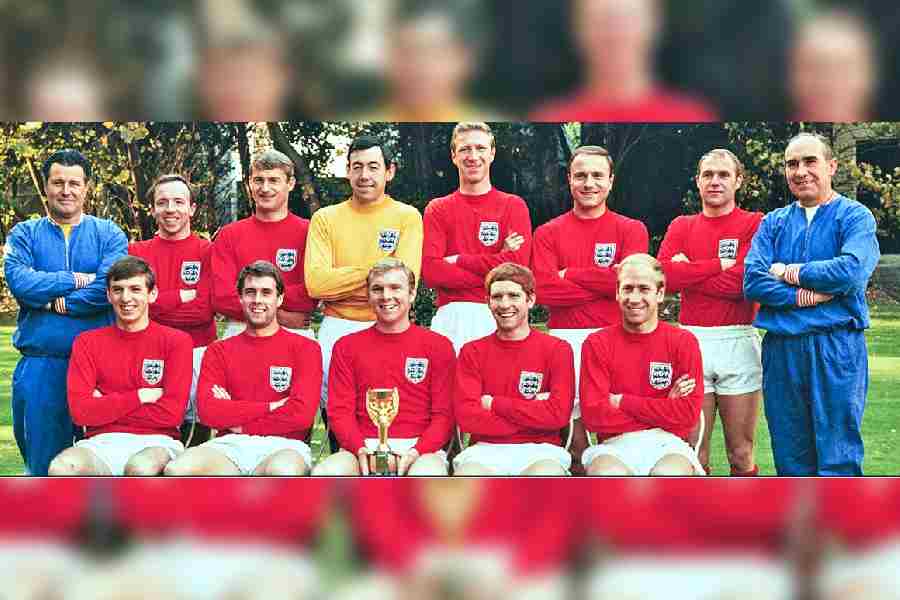 The 1966 World Cup-winning England team pose with the trophy. (Top row left to right) Trainer Harold Shepherdson, Nobby Stiles, Roger Hunt, Gordon Banks, Jack Charlton, George Cohen, Ray Wilson, Manager Alf Ramsey, and (bottom row) Martin Peters, Geoff Hurst, Bobby Moore, Alan Ball and Bobby Charlton.