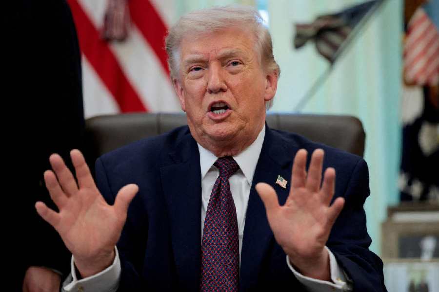 US President Donald Trump raises his fist as he returns to the White House, in Washington, D.C., US, May 31, 2026.