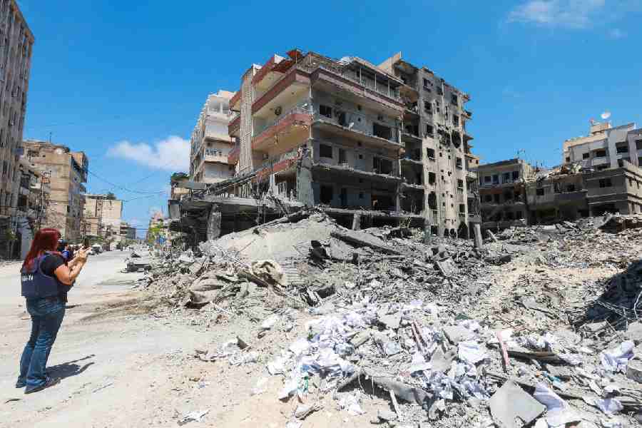 A person stands near the site of an Israeli strike carried out last week, in Tyre, Lebanon, June 2, 2026.