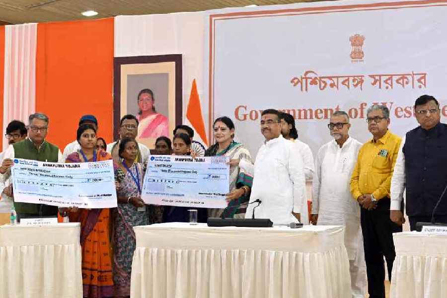 Chief minister Suvendu Adhikari, minister for women and child development and social welfare, urban development and municipal affairs Agnimitra Paul and others present during the launch of the Annapurna Yojana at Nabanna on Wednesday.
