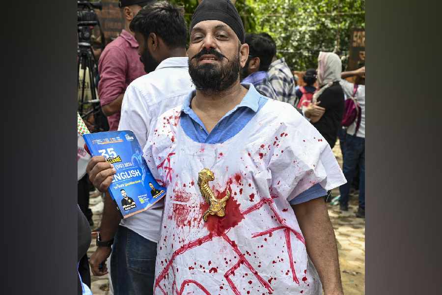 : A supporter during a protest by Cockroach Janta Party (CJP) demanding the resignation of Union Education Minister Dharmendra Pradhan over alleged examination-related lapses, at the Jantar Mantar, in New Delhi, Saturday, June 6, 2026. 