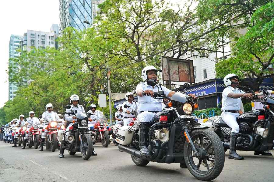 Kolkata Police lead the bike rally from The American Center