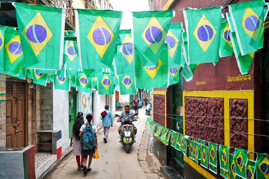 Entire streets have been decorated with Brazilian flags in north Kolkata, near Girish Park