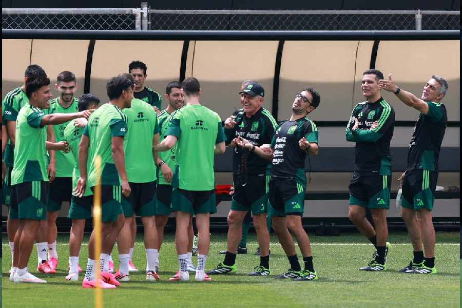 Mexico coach Javier Aguirre, assistant coach Rafael Marquez, and team members during training