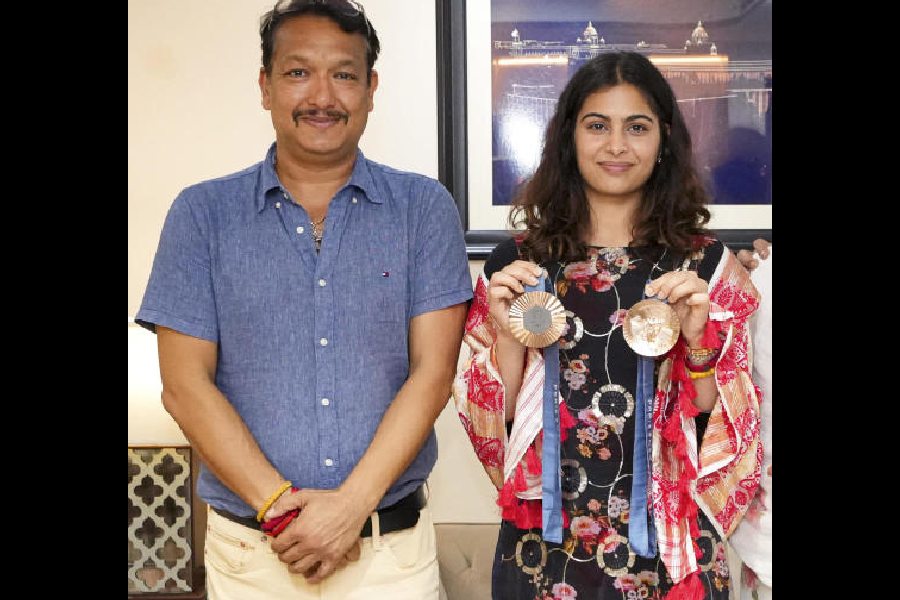 Shooting coach Jaspal Rana (left) with his protege Manu Bhaker in New Delhi on August 16, 2024.