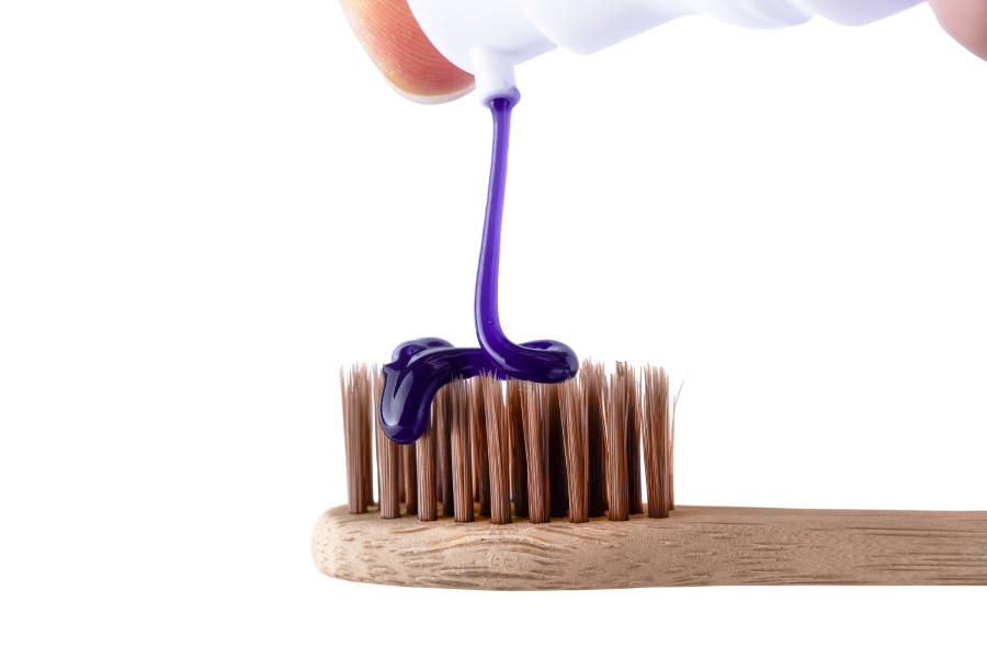 Purple toothpaste is essentially standard toothpaste mixed with purple dyes to neutralise yellow tones on your teeth, temporarily